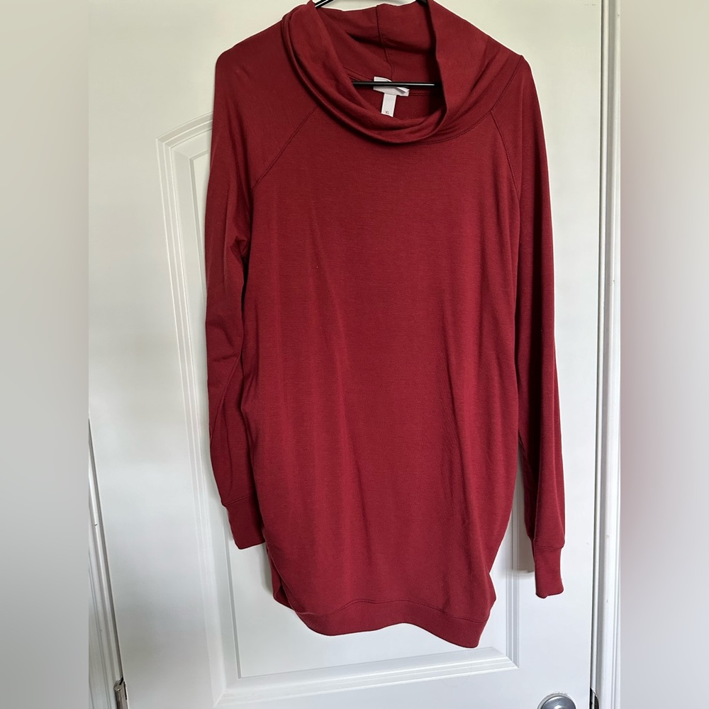 Wine color mock neck maternity top.